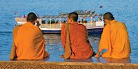 Monks by Medkong River in Phnom Penh, Cambodia